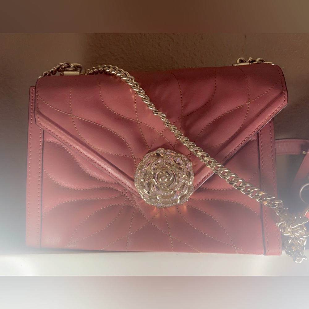Perfect size pink cross body with gold detail and diamonds